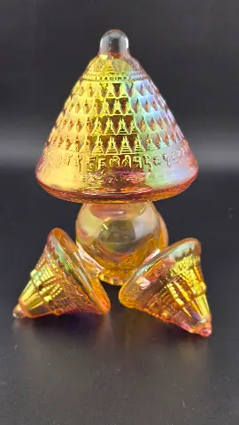 Amber Crown glass mushroom sculpture, detail of ribbed stems and clear glass base