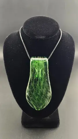 Forest Rain, a hand-blown glass pendant by Jared Omas in rich green tones with tiny suspended bubbles